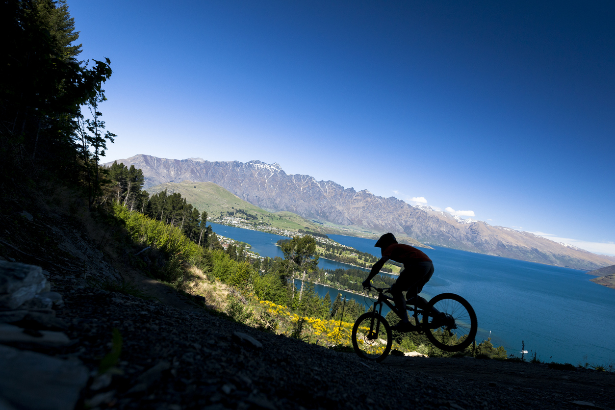 Silhouette of mountain bike rider in Queenstown, New Zealand